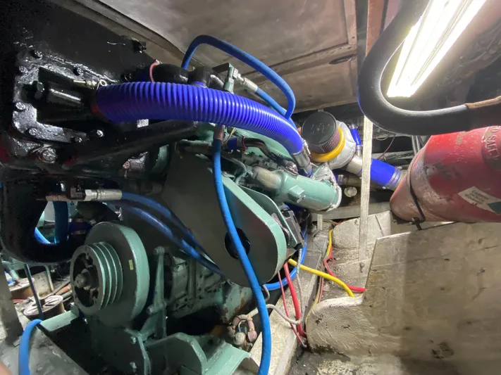  Yacht Photos Pics Engine room of 1982 Bertram 46.6 War Wagon with visible machinery and wiring.