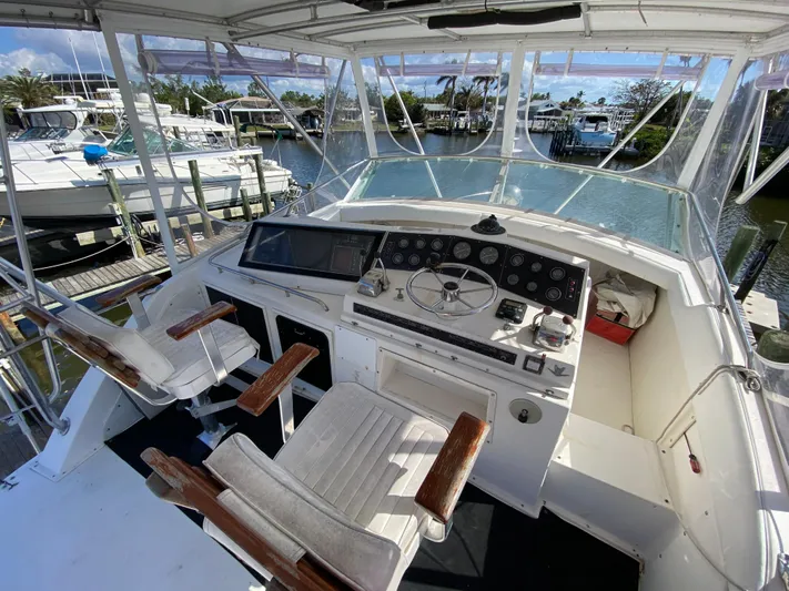  Yacht Photos Pics Cockpit of 1982 Bertram 46.6 War Wagon yacht with helm and seating.
