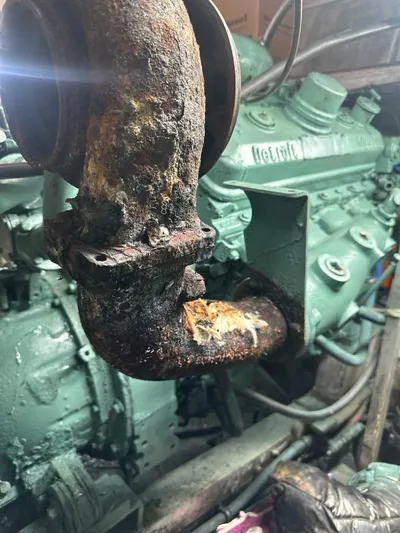  Yacht Photos Pics Rusty engine component of a 1982 Bertram 46.6 War Wagon boat.