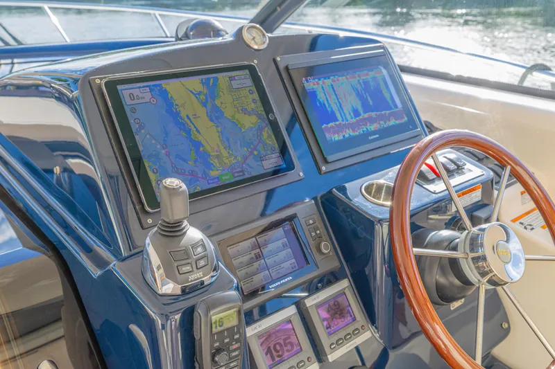  Yacht Photos Pics Helm of 2011 Tiara Yachts 4300 Sovran with navigation screens and controls.