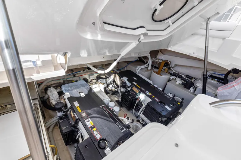  Yacht Photos Pics Engine room of 2011 Tiara Yachts 4300 Sovran, showcasing dual engines and mechanical components.