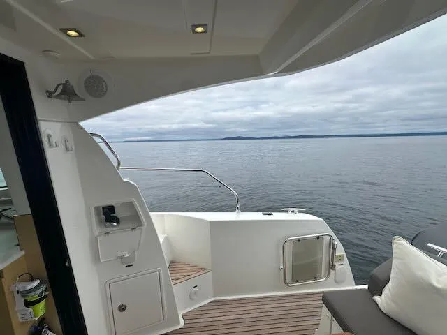 R & R Yacht Photos Pics Prestige 420 yacht deck with ocean view, 2015 model, featuring sleek design and comfortable seating.