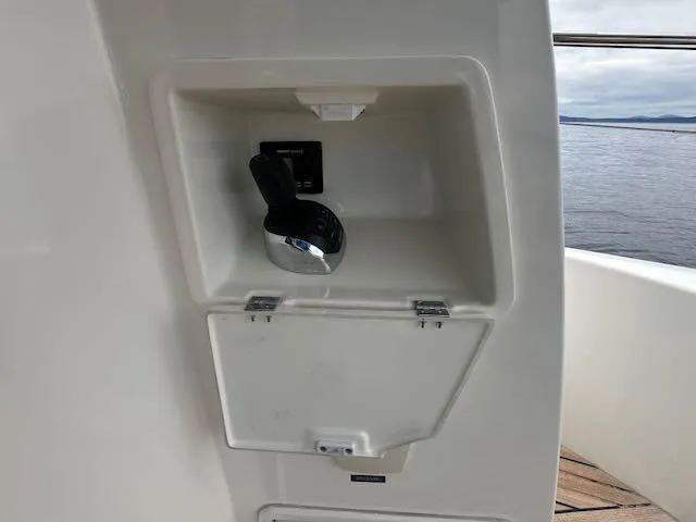 R & R Yacht Photos Pics Control panel on a 2015 Prestige 420 yacht, overlooking the water.
