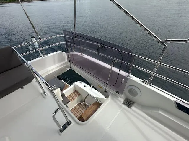 R & R Yacht Photos Pics Flybridge view of 2015 Prestige 420 yacht with sleek design and ocean backdrop.