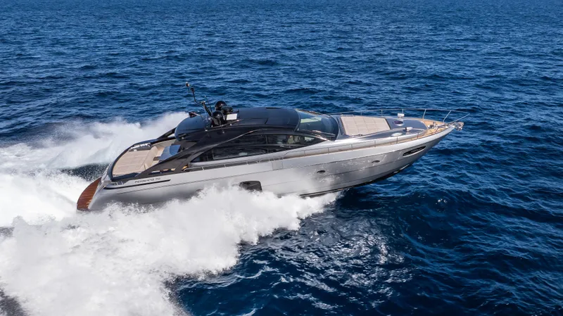 "liquid" Yacht Photos Pics 2020 Pershing 70 yacht cruising on open sea, showcasing sleek design and powerful performance.