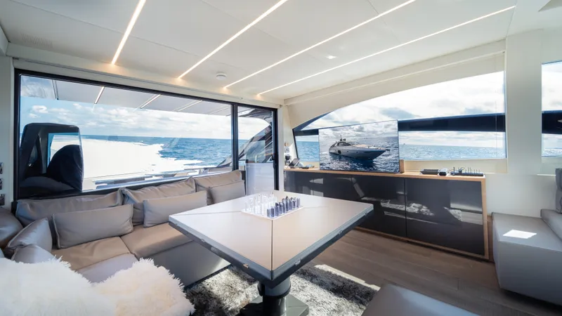 "liquid" Yacht Photos Pics Luxurious interior of 2020 Pershing 70 yacht with ocean view and modern furnishings.