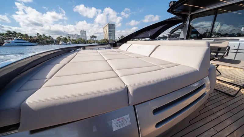 "liquid" Yacht Photos Pics 2020 Pershing 70 yacht with spacious sun deck and luxurious seating.