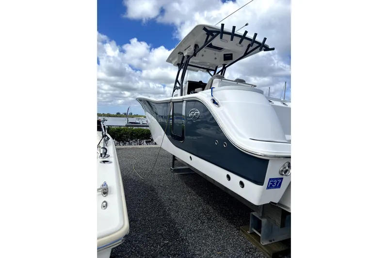  Yacht Photos Pics 2021 Sea Fox 288 Commander boat displayed outdoors under a cloudy sky.