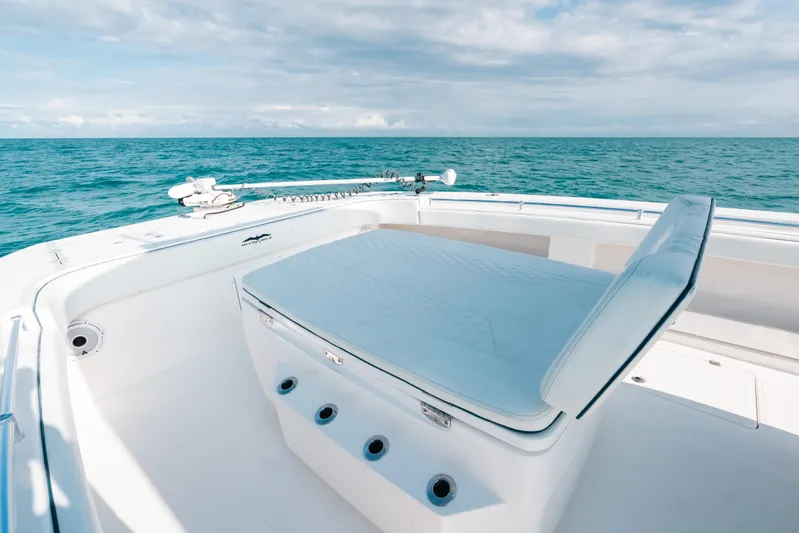  Yacht Photos Pics Invincible 37 Catamaran 2021 on open sea, featuring spacious deck and seating.