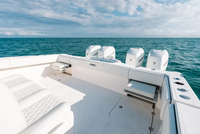  Yacht Photos Pics Invincible 37 Catamaran 2021 on open sea, featuring spacious deck and powerful engines.