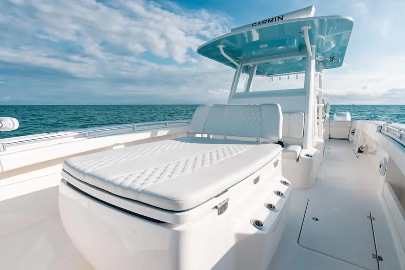  Yacht Photos Pics Invincible 37 Catamaran 2021 on open sea, featuring sleek design and spacious deck.