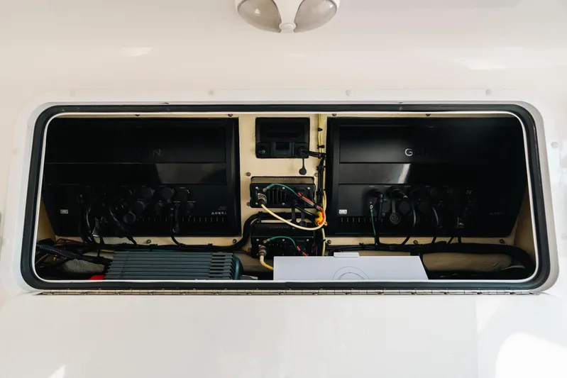 Yacht Photos Pics Electrical compartment of 2021 Invincible 37 Catamaran with Garmin equipment and wiring.