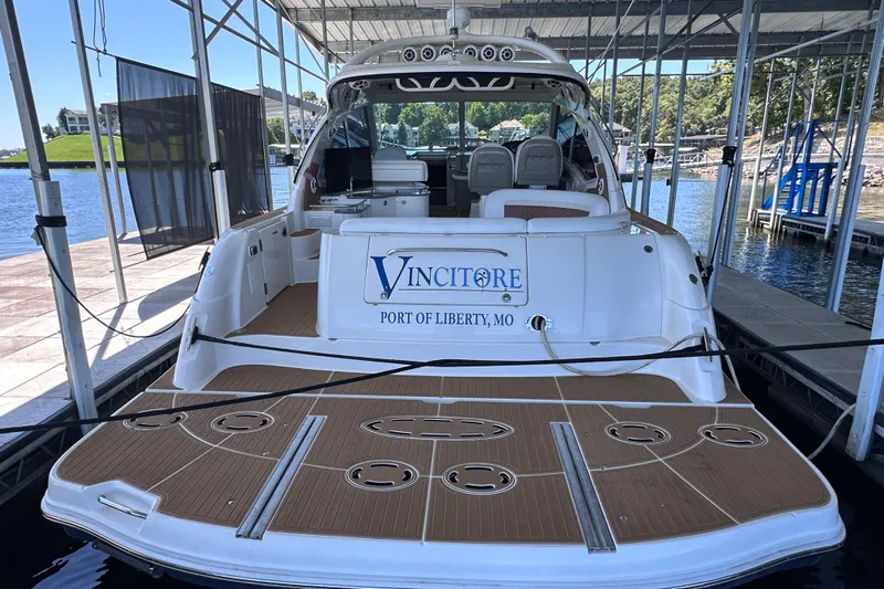  Yacht Photos Pics 2005 Sea Ray 48 Sundancer docked, rear view with "Vincitore" signage, Port of Liberty, MO.