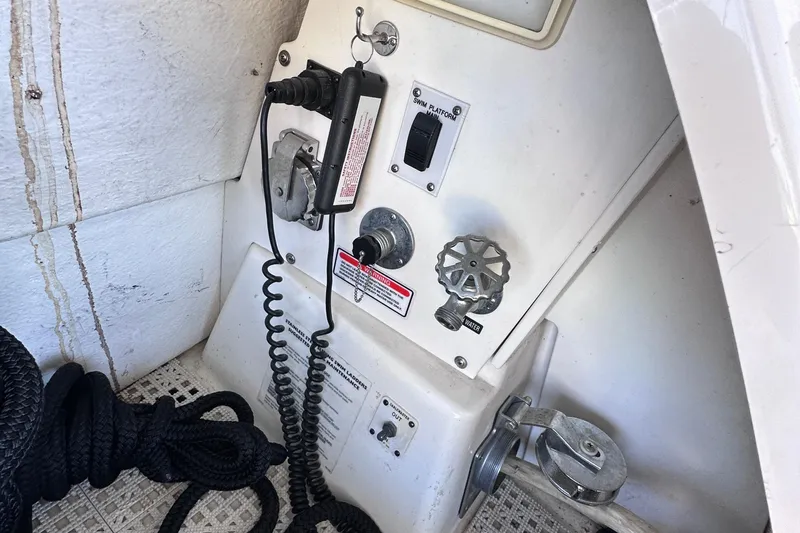  Yacht Photos Pics Control panel on a 2005 Sea Ray 48 Sundancer boat with coiled rope and switches.