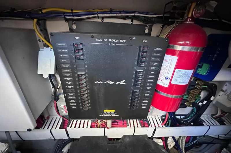 Yacht Photos Pics Electrical panel of a 2005 Sea Ray 48 Sundancer boat with fire extinguisher.
