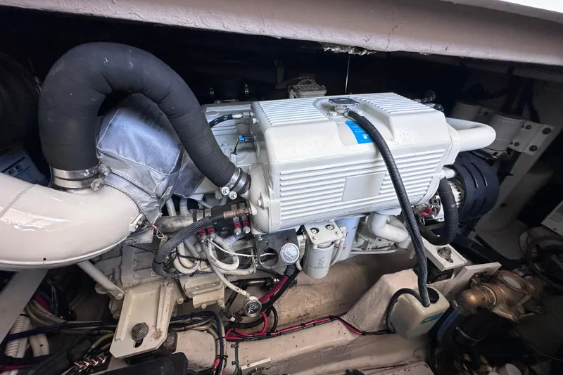  Yacht Photos Pics Engine compartment of a 2005 Sea Ray 48 Sundancer yacht, showcasing detailed machinery.