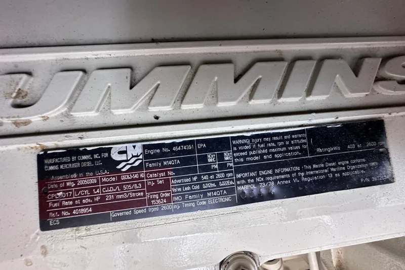  Yacht Photos Pics Cummins engine label on a 2005 Sea Ray 48 Sundancer, detailing specifications and compliance.