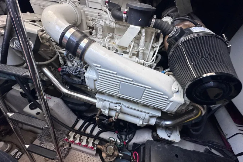  Yacht Photos Pics Engine compartment of a 2005 Sea Ray 48 Sundancer yacht, showcasing detailed components.