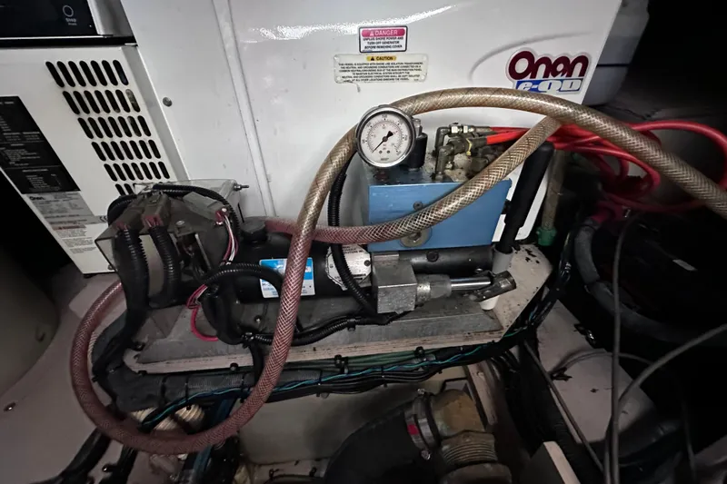  Yacht Photos Pics Engine room of 2005 Sea Ray 48 Sundancer with Onan generator and mechanical components.