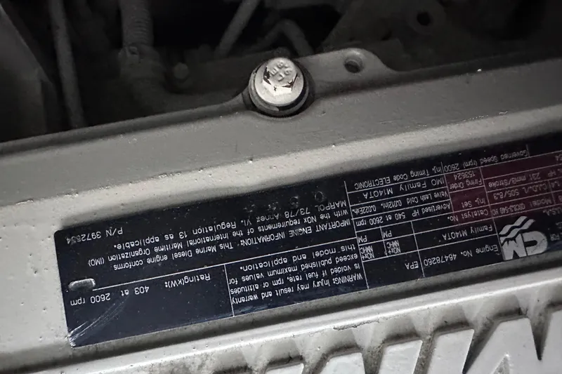  Yacht Photos Pics Engine label of a 2005 Sea Ray 48 Sundancer boat, displaying technical specifications.