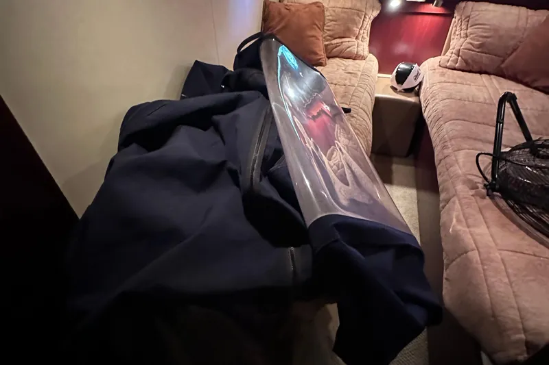  Yacht Photos Pics Interior of 2005 Sea Ray 48 Sundancer with cozy seating and nautical gear.