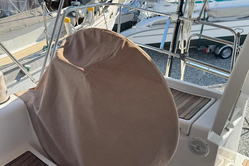 Eos Yacht Photos Pics Beneteau Oceanis 40 sailboat cockpit with covered steering wheel, 2008 model.