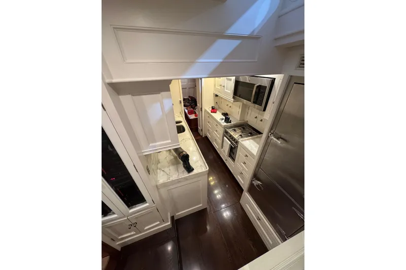 Bequia Yacht Photos Pics Luxurious yacht kitchen with modern appliances, marble countertops, and sleek cabinetry, Brooklin Boat Yard 2009.