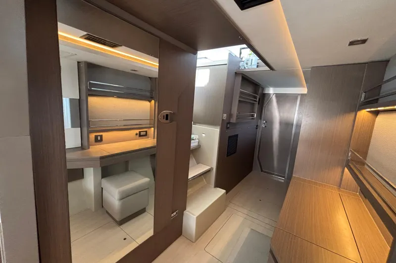  Yacht Photos Pics Luxurious interior of 2022 Leopard 45 yacht with modern wood finishes and ambient lighting.