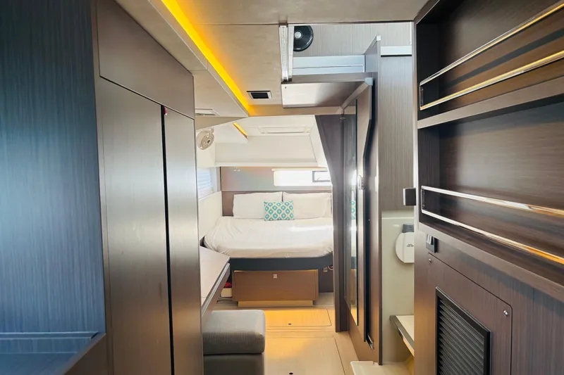  Yacht Photos Pics Interior of 2022 Leopard 45 yacht, featuring modern design and cozy bedroom.