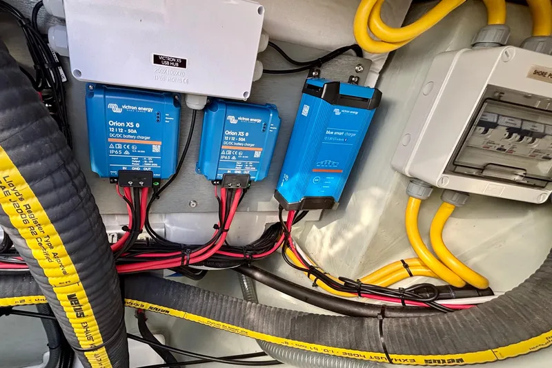  Yacht Photos Pics Electrical system with Victron Energy chargers in a 2022 Leopard 45 yacht.