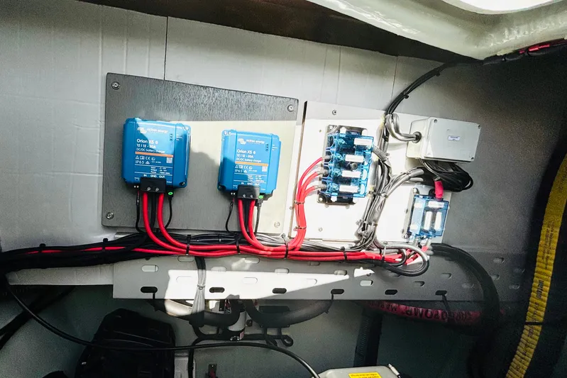  Yacht Photos Pics Electrical system setup in a 2022 Leopard 45, featuring Victron Energy components and wiring.