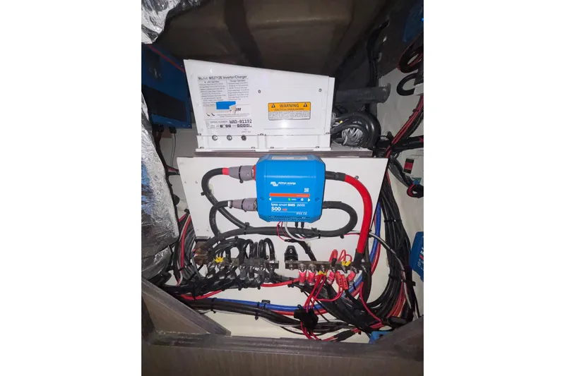 Yacht Photos Pics Electrical system setup in a 2022 Leopard 45, featuring inverter and wiring components.