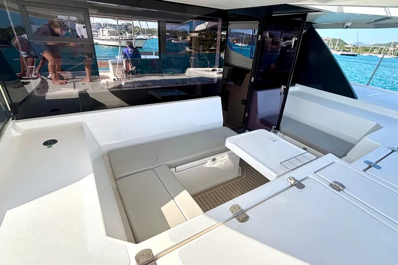  Yacht Photos Pics Luxurious 2022 Leopard 45 yacht interior with spacious seating and ocean view.