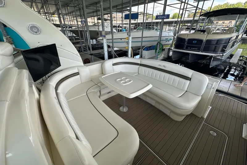  Yacht Photos Pics Luxurious 2007 Sea Ray 40 Sundancer yacht interior with plush seating and mounted TV.