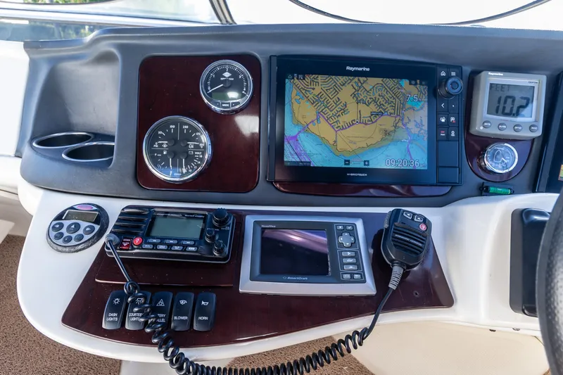  Yacht Photos Pics Dashboard of a 2009 Meridian 391 Sedan with navigation and communication equipment.