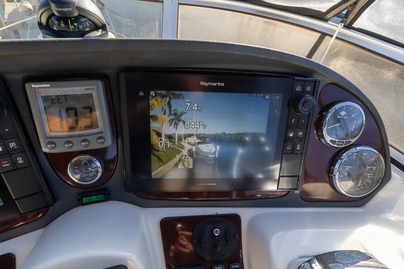  Yacht Photos Pics 2009 Meridian 391 Sedan dashboard with navigation and depth display.