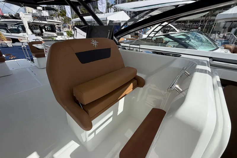  Yacht Photos Pics Luxurious Jeanneau TH38 boat interior, featuring sleek seating and modern design, 2026 model.
