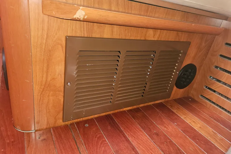 Soirse Yacht Photos Pics Wooden interior of 2013 Marlow-Hunter 50 aft cabin with vent detail.