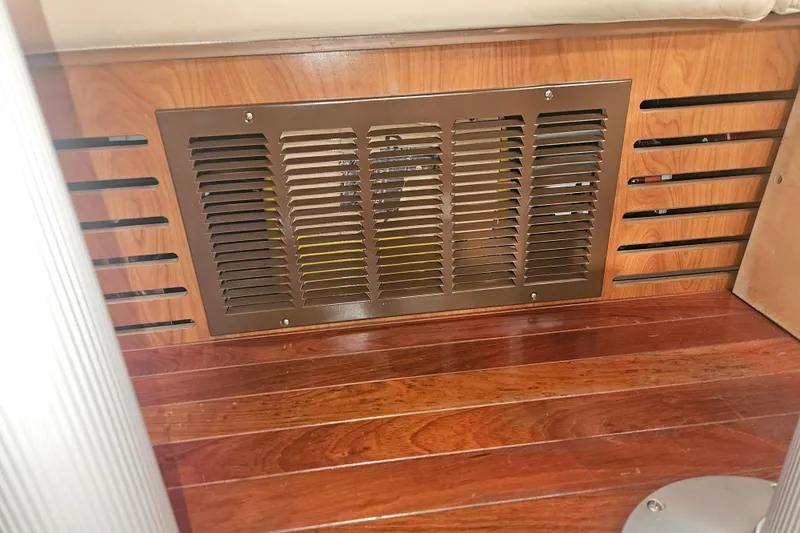 Soirse Yacht Photos Pics Ventilation grille on 2013 Marlow-Hunter 50 aft cabin with wooden interior.