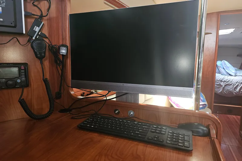 Soirse Yacht Photos Pics Computer setup in 2013 Marlow-Hunter 50 aft cabin yacht interior.