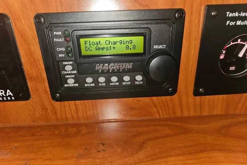 Soirse Yacht Photos Pics Control panel on 2013 Marlow-Hunter 50 aft cabin, displaying float charging status.