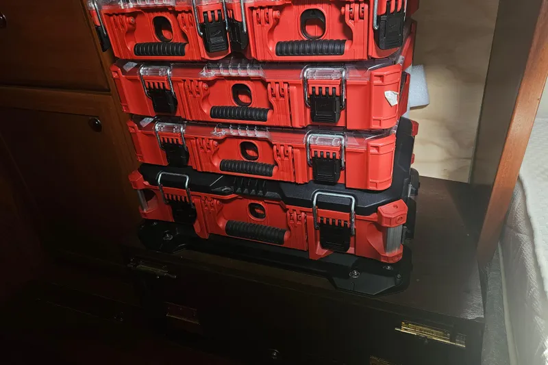 Soirse Yacht Photos Pics Stacked red toolboxes in a 2013 Marlow-Hunter 50 aft cabin interior.