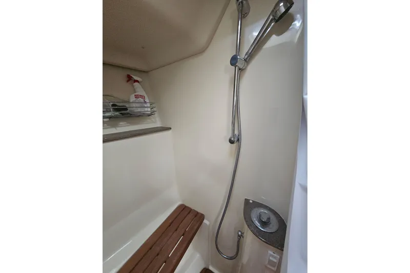 Soirse Yacht Photos Pics Shower area in 2013 Marlow-Hunter 50 aft cabin yacht with wooden bench.