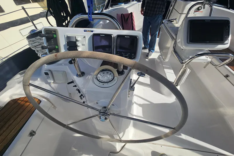Soirse Yacht Photos Pics Steering wheel and navigation controls on 2013 Marlow-Hunter 50 aft cabin yacht.
