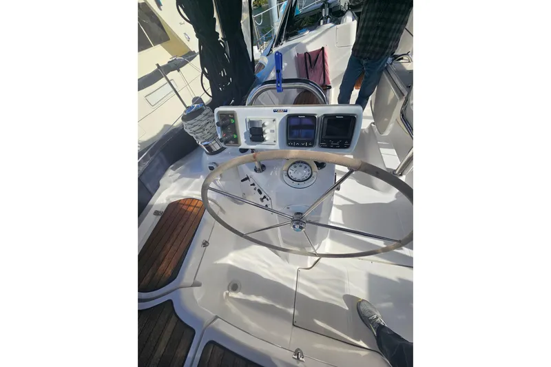 Soirse Yacht Photos Pics Steering wheel and controls of 2013 Marlow-Hunter 50 aft cabin sailboat.