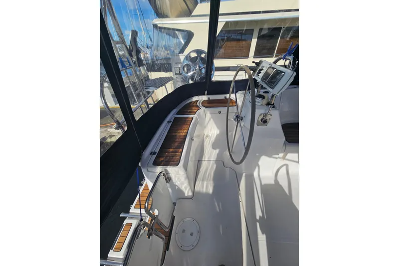 Soirse Yacht Photos Pics 2013 Marlow-Hunter 50 aft cabin yacht cockpit with steering wheel and navigation equipment.