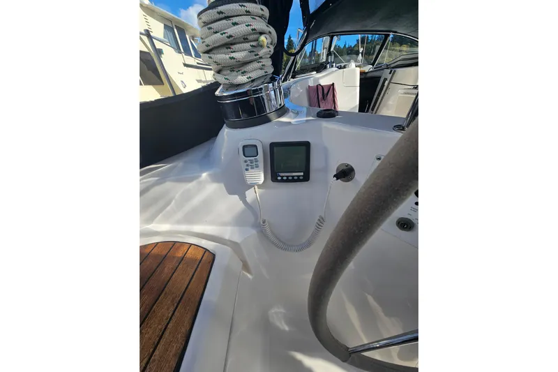 Soirse Yacht Photos Pics Cockpit of 2013 Marlow-Hunter 50 aft cabin sailboat with navigation equipment.