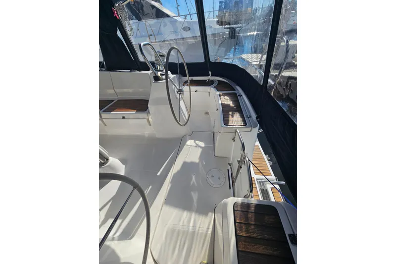 Soirse Yacht Photos Pics 2013 Marlow-Hunter 50 aft cabin yacht cockpit with steering wheel and seating.