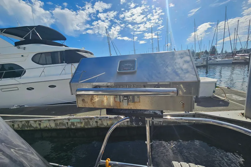 Soirse Yacht Photos Pics Stainless steel grill on a 2013 Marlow-Hunter 50 aft cabin yacht at marina.