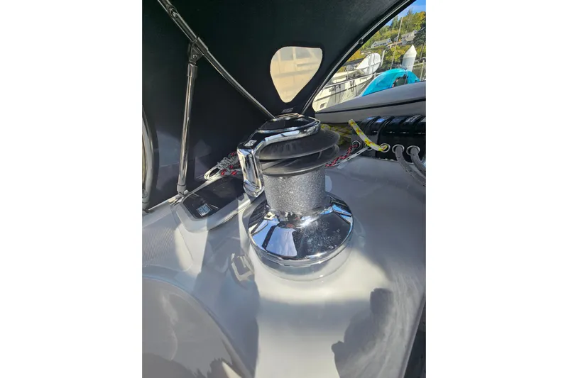 Soirse Yacht Photos Pics Winch on 2013 Marlow-Hunter 50 aft cabin sailboat deck, with ropes and equipment.